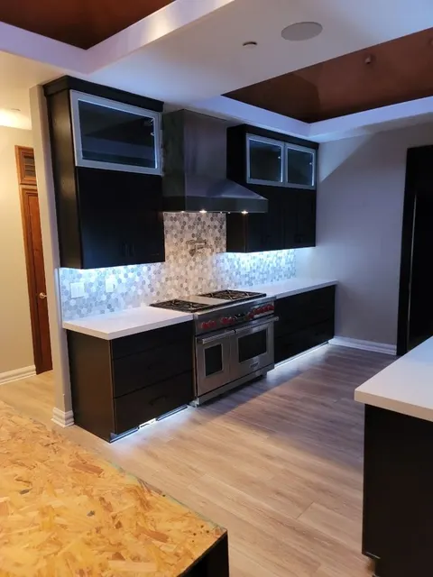Stove and cabinetry installation in remodeled kitchen Goodyear AZ